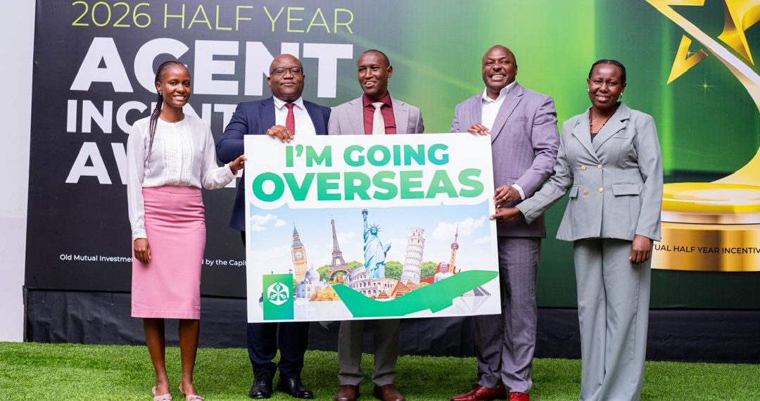 The two winners Daniel & Edmund getting their ticket from Caroline O Elliot (Markrting & Comms Specialist) & Zac Kisesi -MD Old Mutual Investment Group (OMIG)