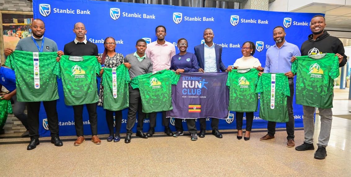 Stanbic Bank Run Club members and other officials display the Virunga Gorilla Marathon 2026 Kit